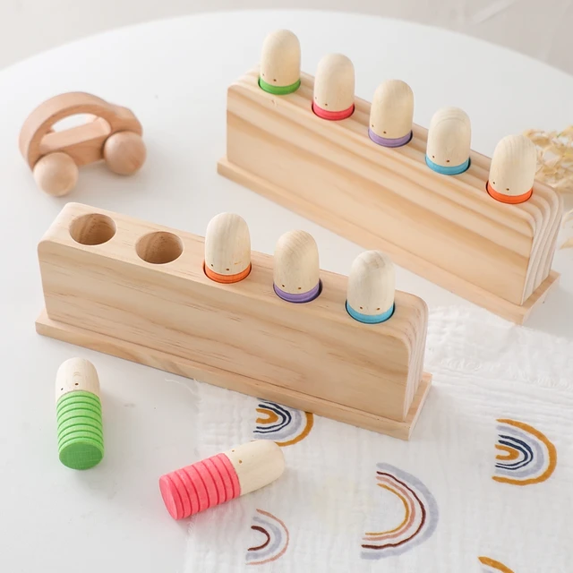 Press and bounce wooden worms