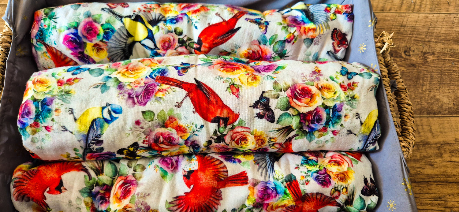 Rosey Feathers Swaddle